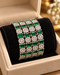 Green and silver 4-piece bangle set in jewellery box