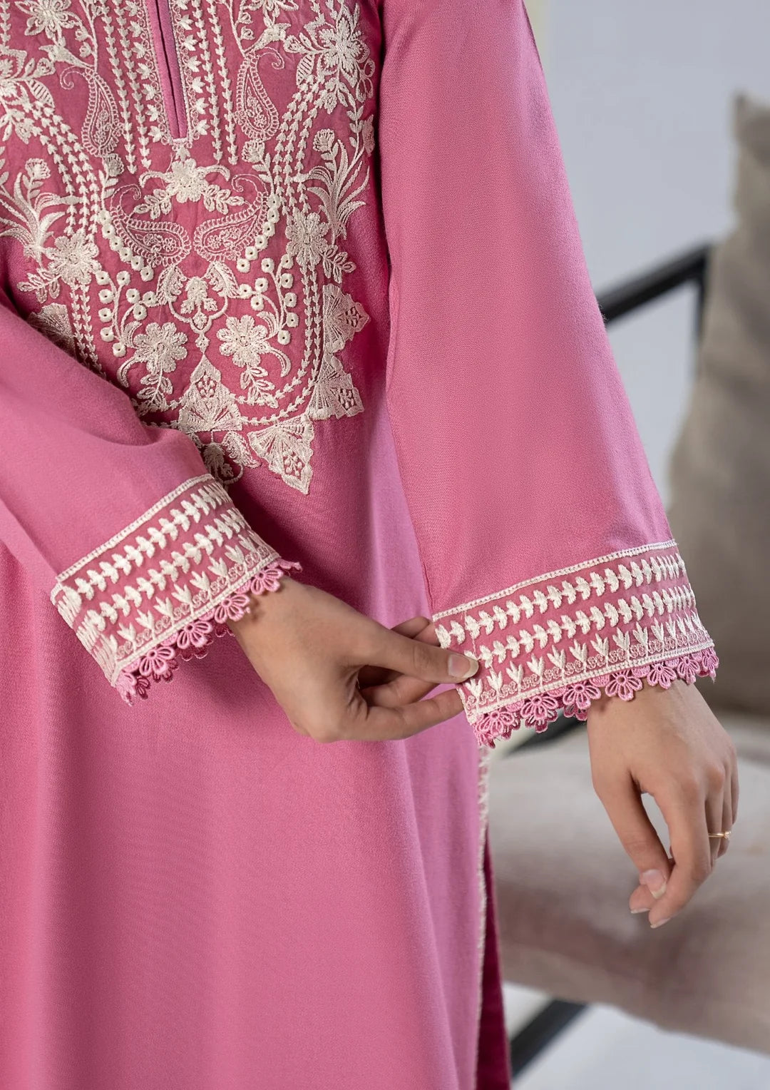 Pink winter suit with ivory-toned neckline embroidery