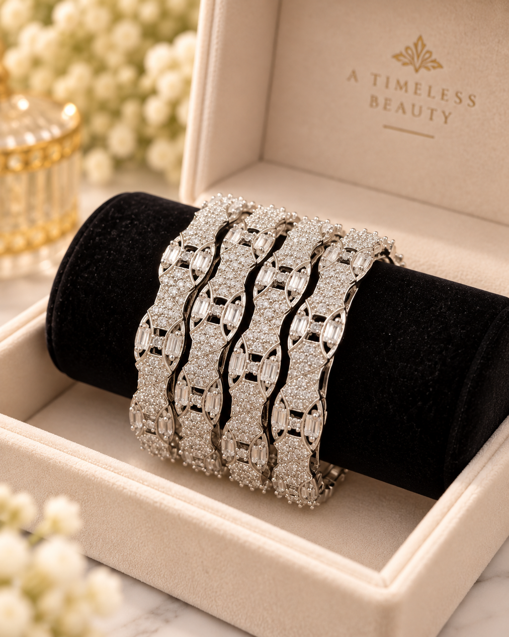 Silver 4-piece bangle set close up in jewellery box