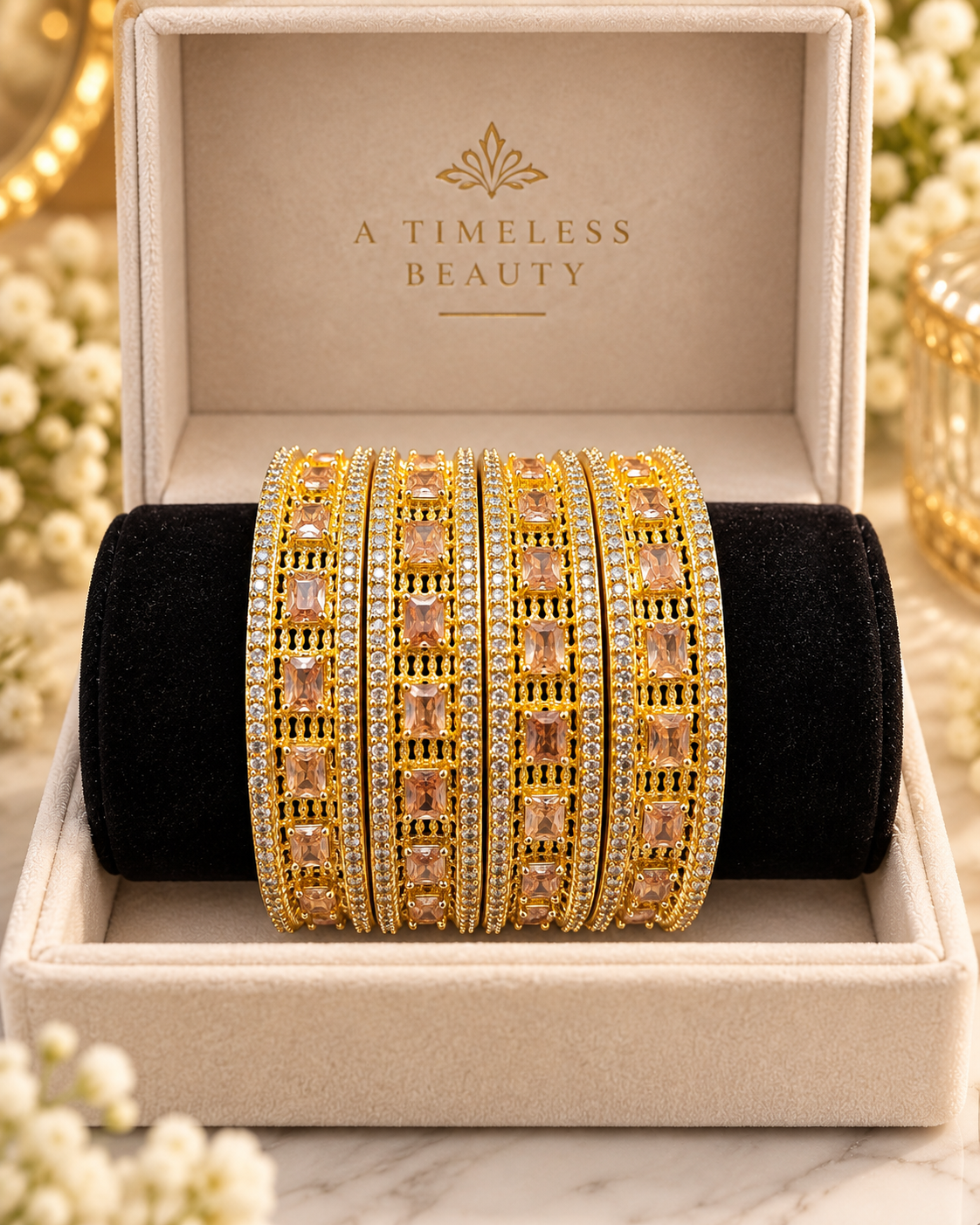 Gold champagne 4-piece bangle set in jewellery box