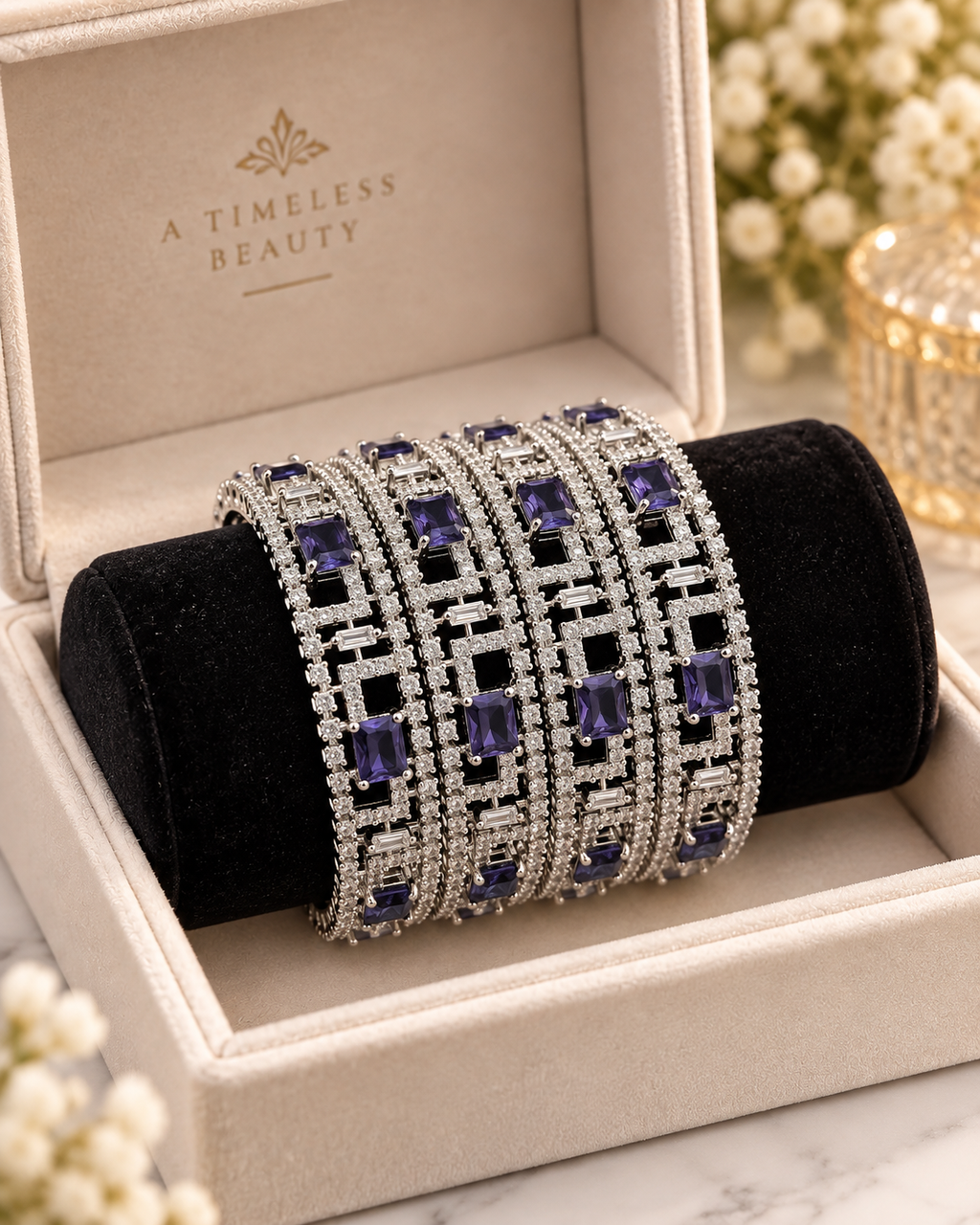 Silver and purple 4-piece bangle set in jewellery box