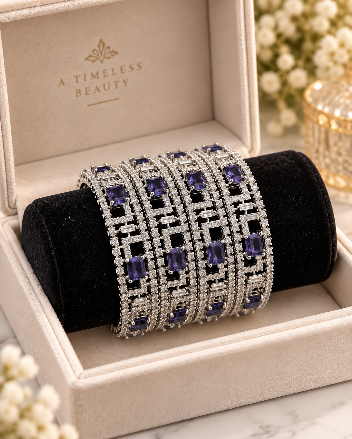 Silver and purple 4-piece bangle set in jewellery box