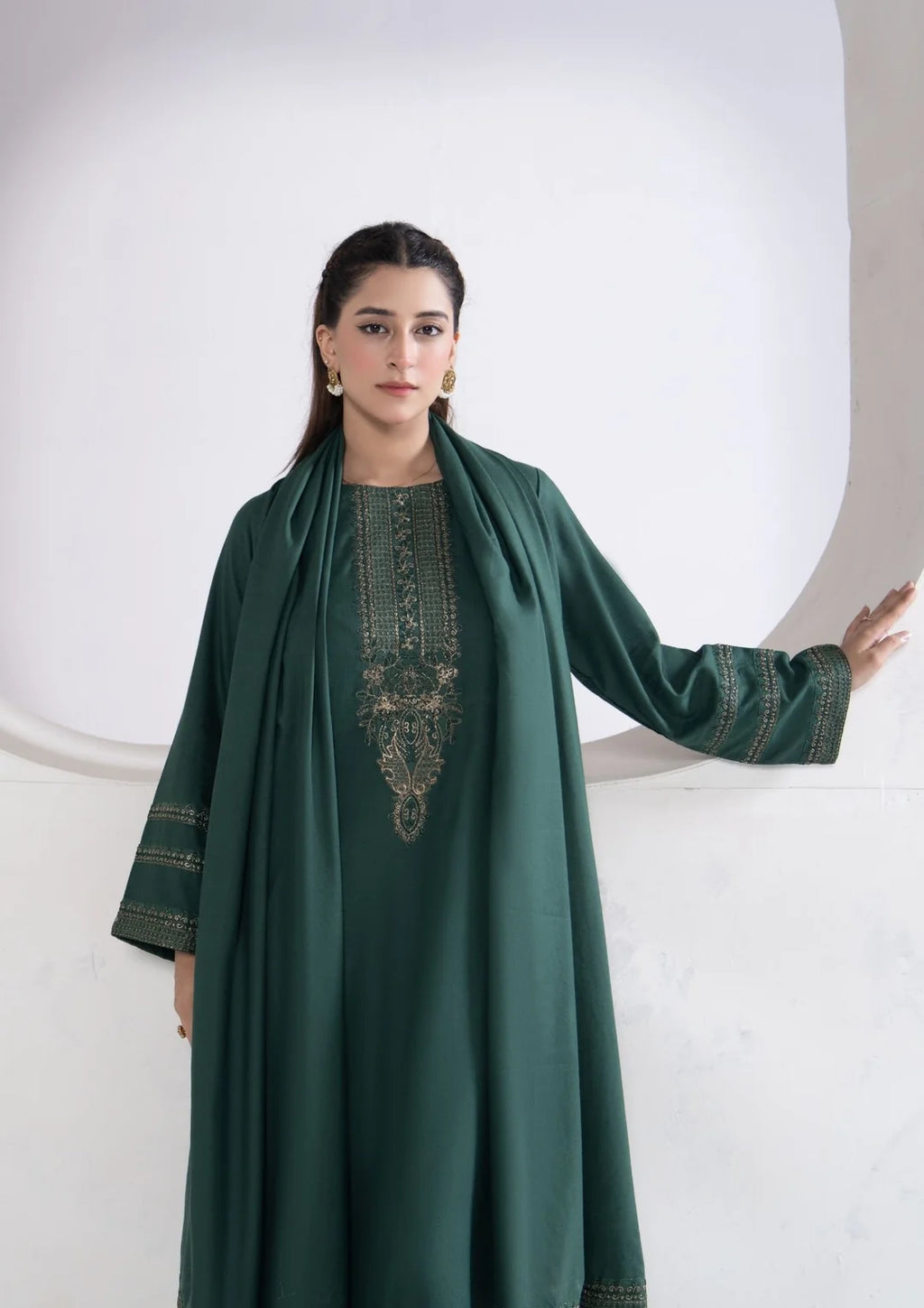Deep green outfit styled with coordinated shawl