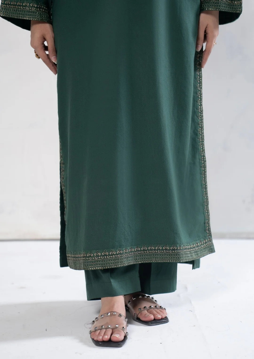 Back view of deep green winter outfit and shawl