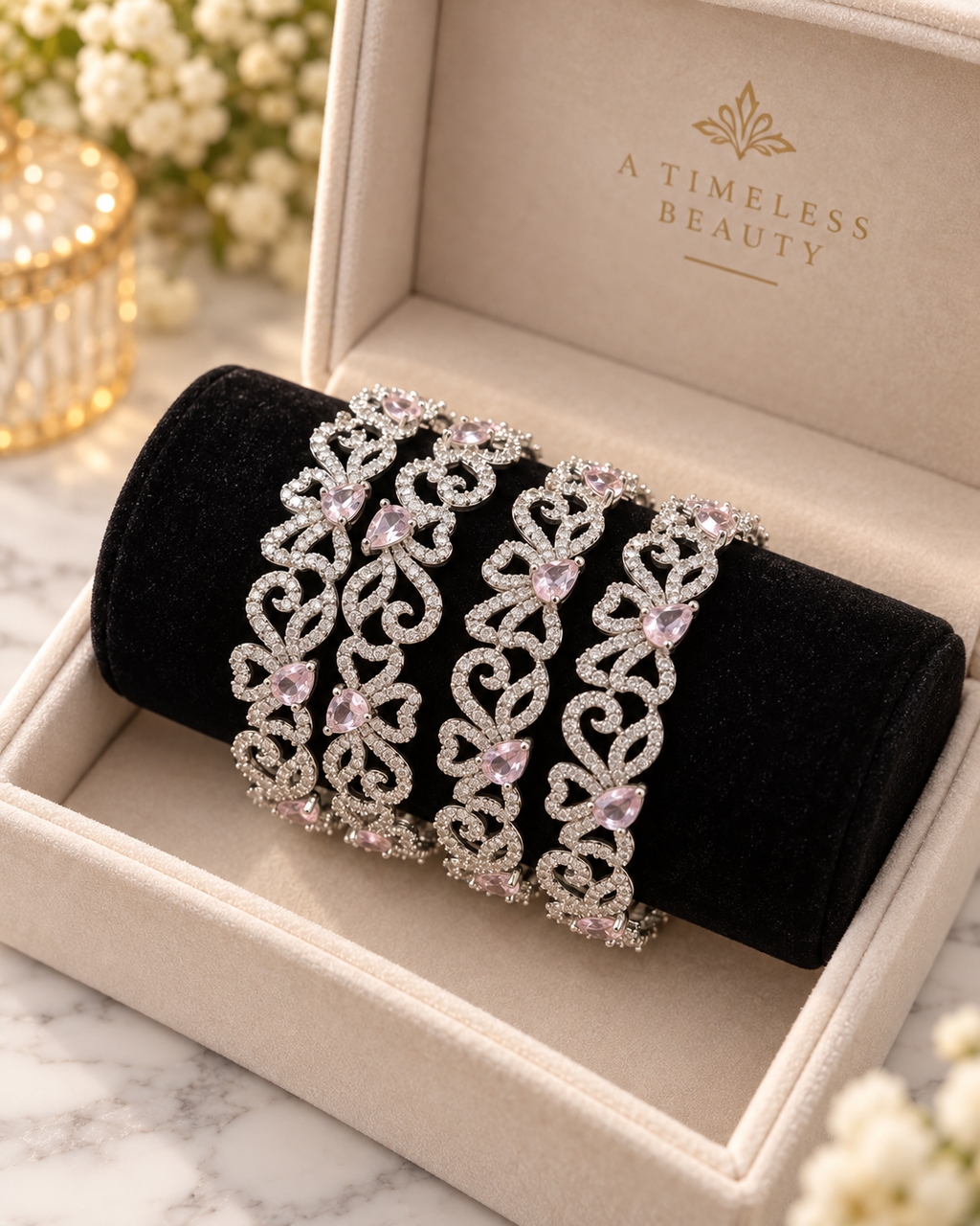 Silver and pink bangles close up