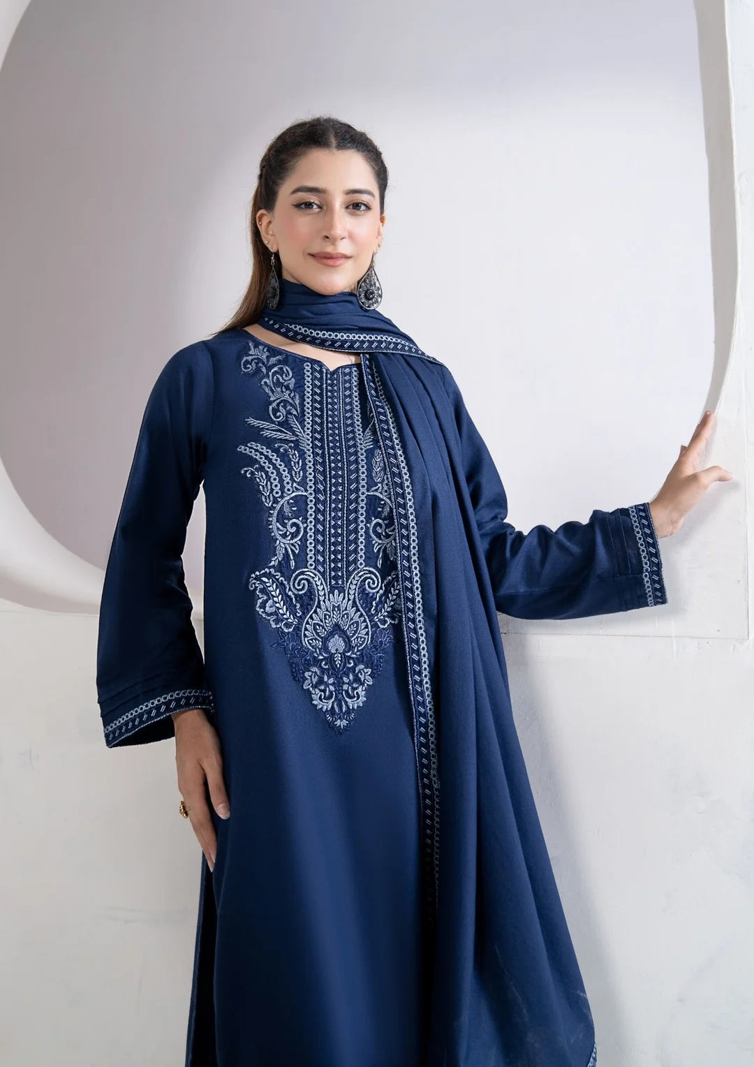 Navy blue winter suit with embroidered sleeves and coordinated shawl
