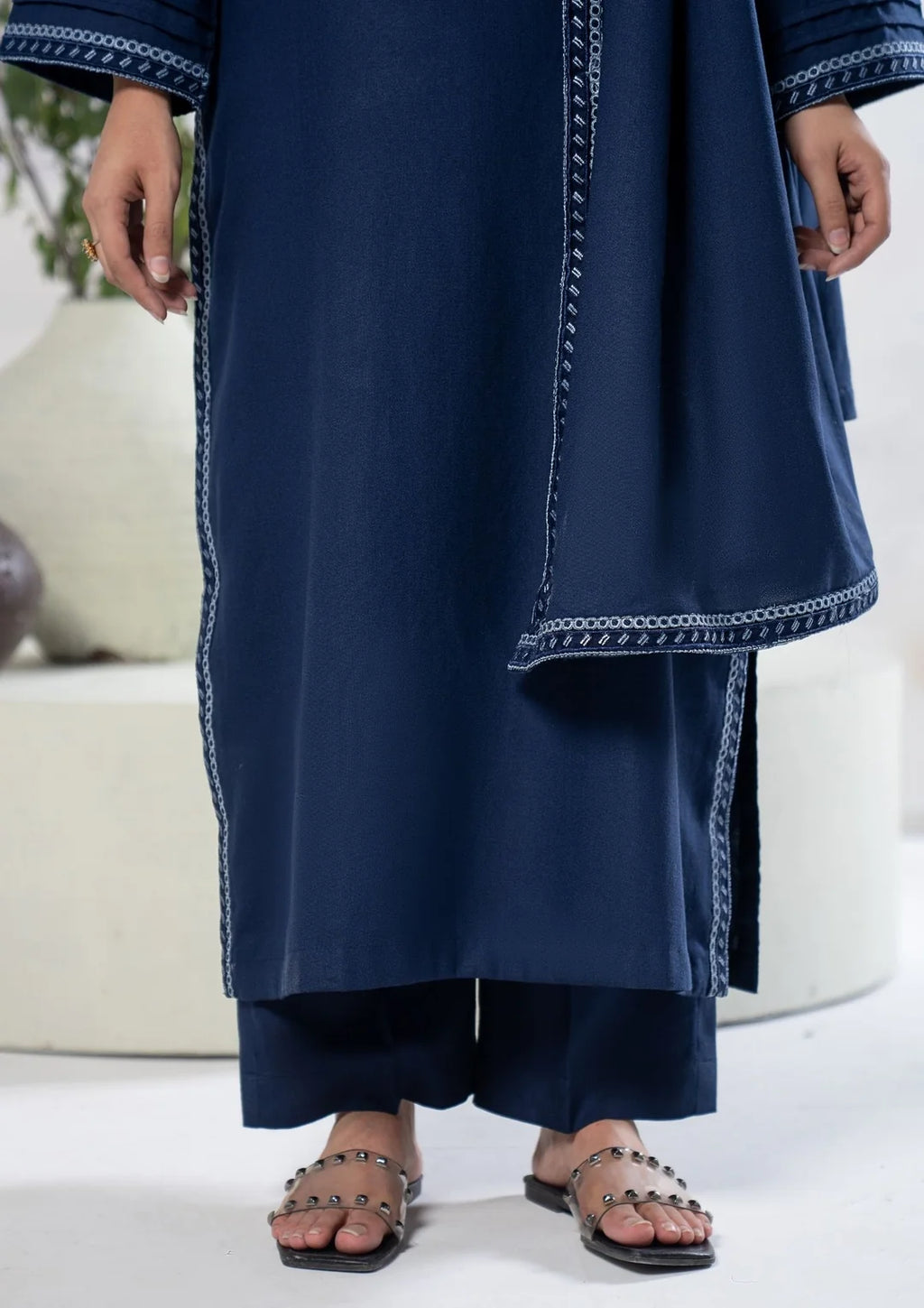 Navy blue trousers and embroidered shawl border