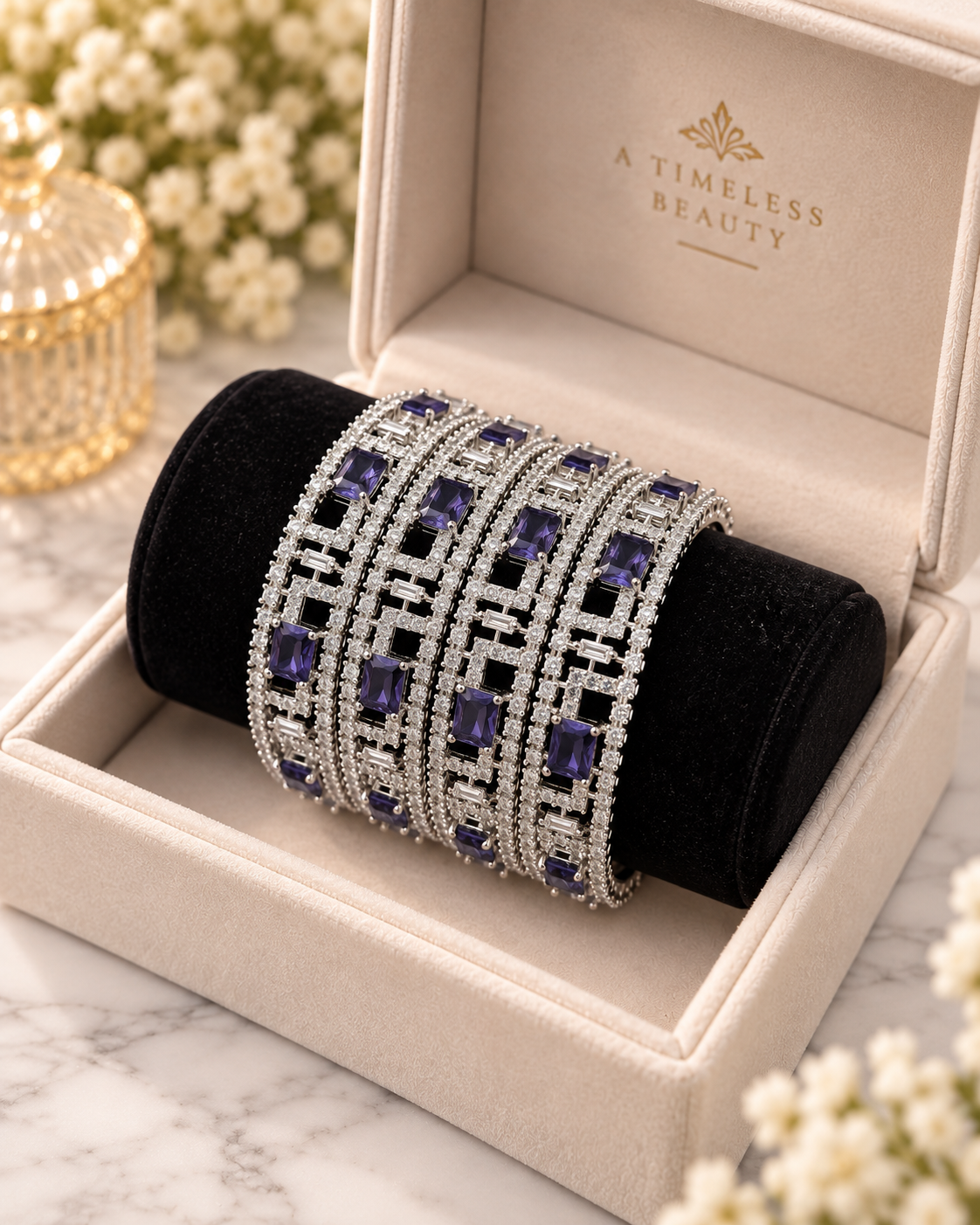 Silver and purple bangles close up