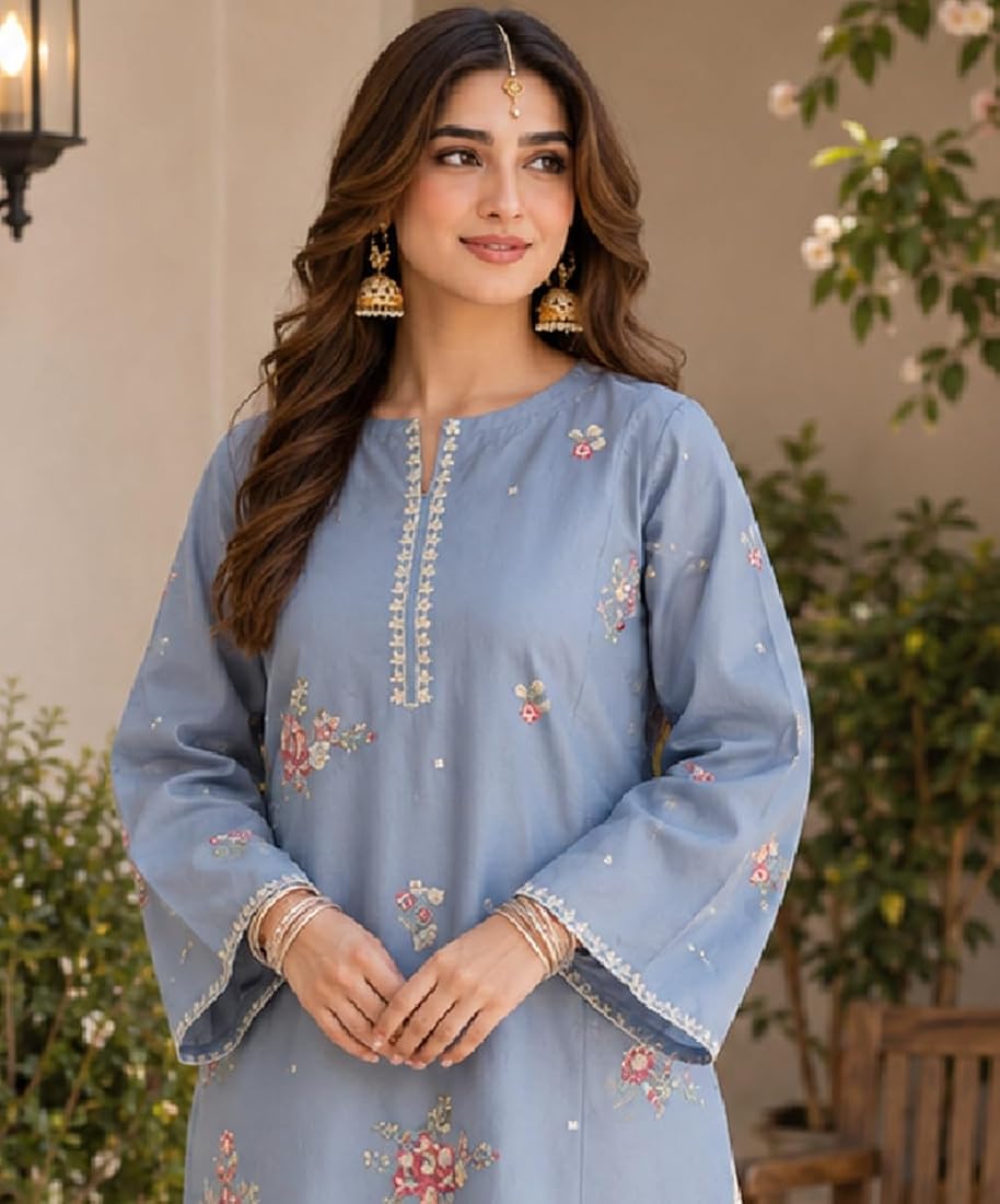 Close-up of blue embroidered cotton lawn shirt with floral detail