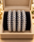 Silver and gray 4-piece bangle set in jewellery box