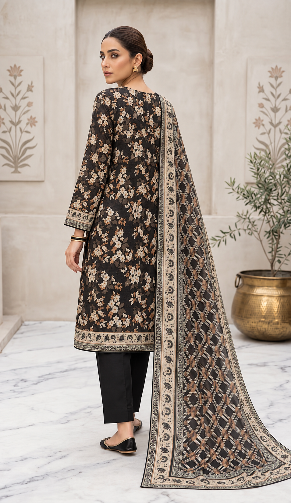 Back view of black floral printed lawn three-piece suit with geometric printed lawn dupatta