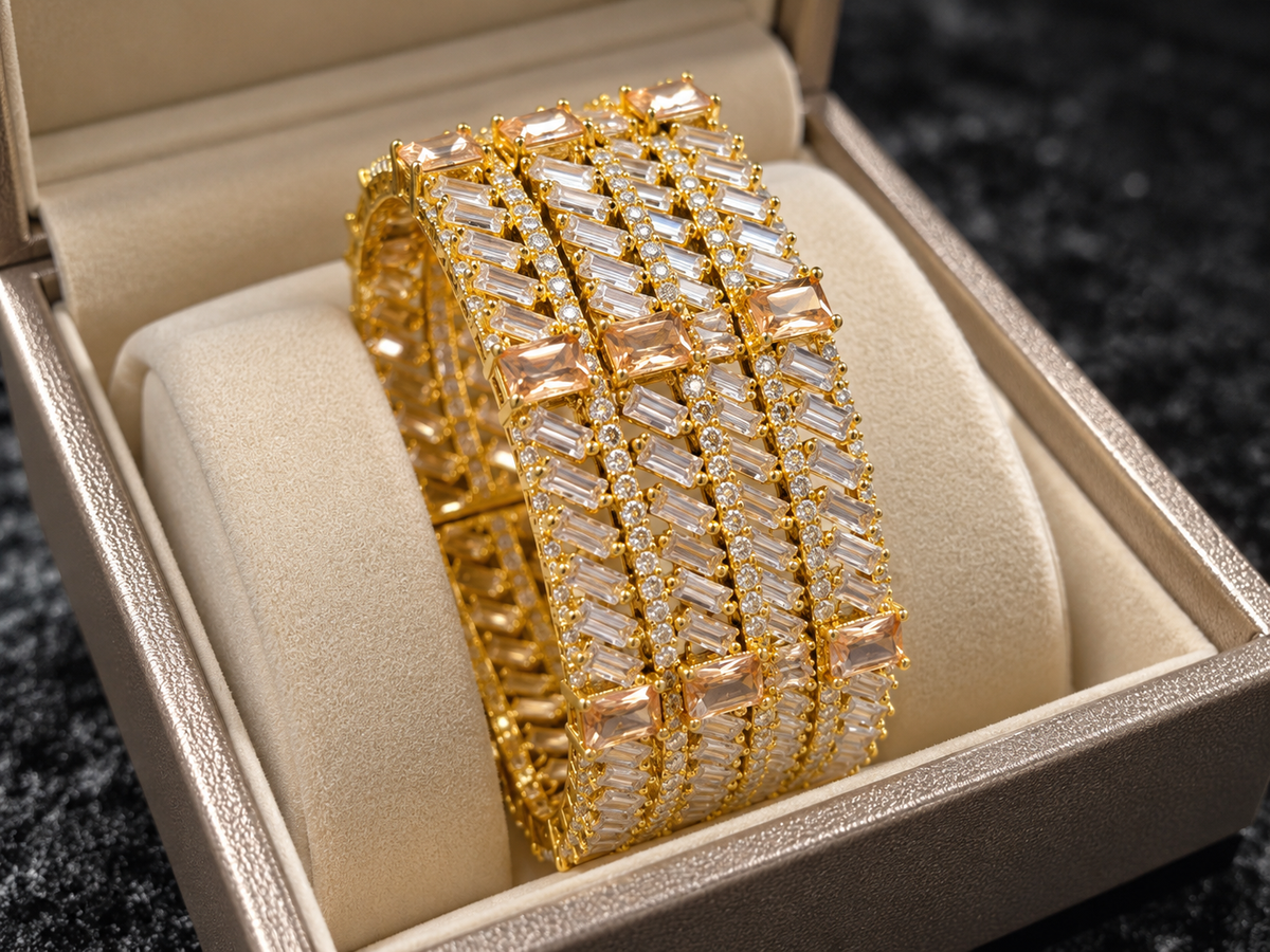 Gold champagne baguette bangles close up