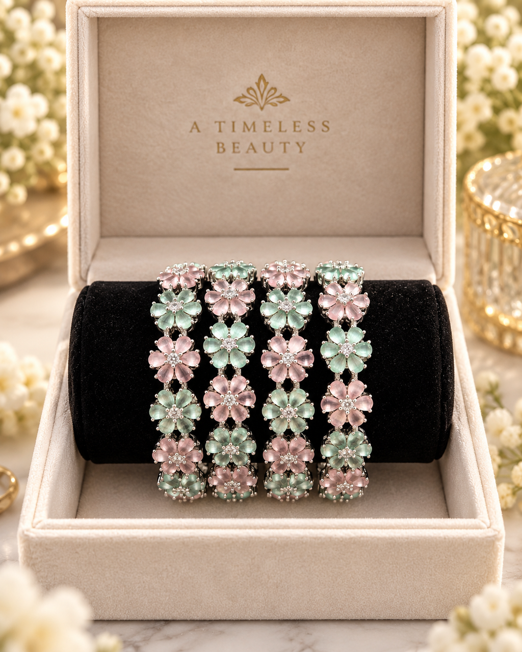 Silver, pink and light green 4-piece bangle set in jewellery box