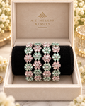 Silver, pink and light green 4-piece bangle set in jewellery box