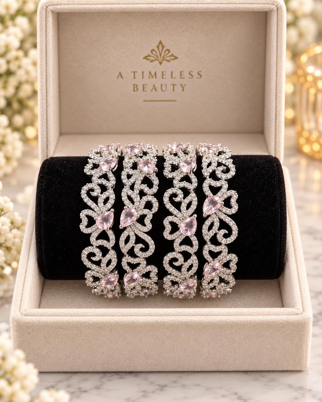 Silver and pink 4-piece bangle set in jewellery box