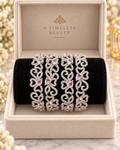 Silver and pink 4-piece bangle set in jewellery box