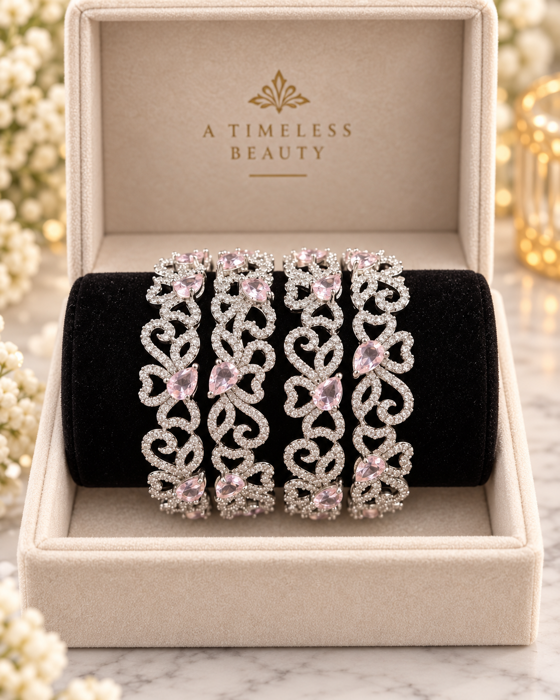 Silver and pink 4-piece bangle set in jewellery box