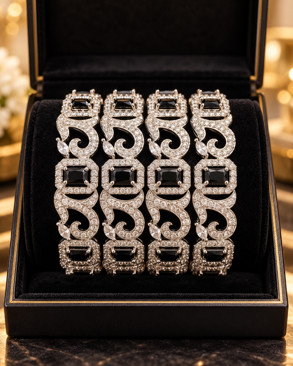 Silver and black 4-piece bangle set in jewellery box
