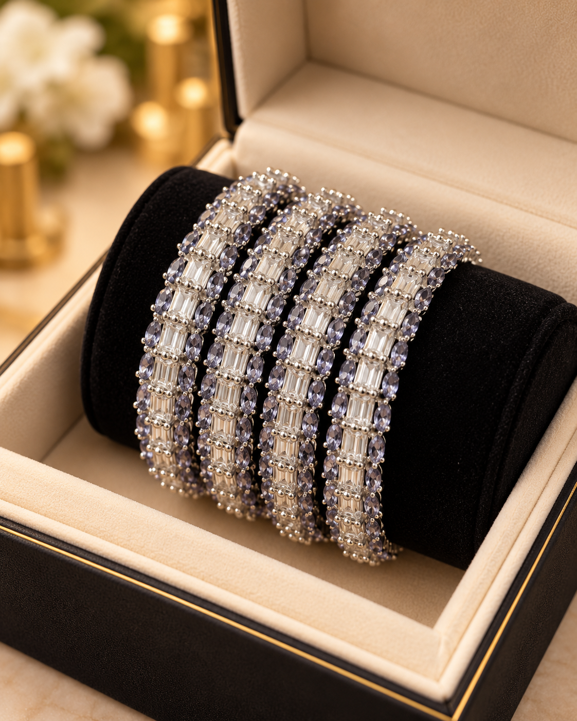 Silver and gray bangles close up in box
