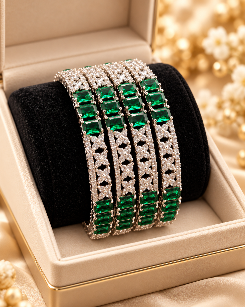 Silver and emerald green bangles close up
