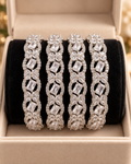 Silver 4-piece bangle set in jewellery box