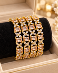 Gold champagne floral bangle set in jewellery box