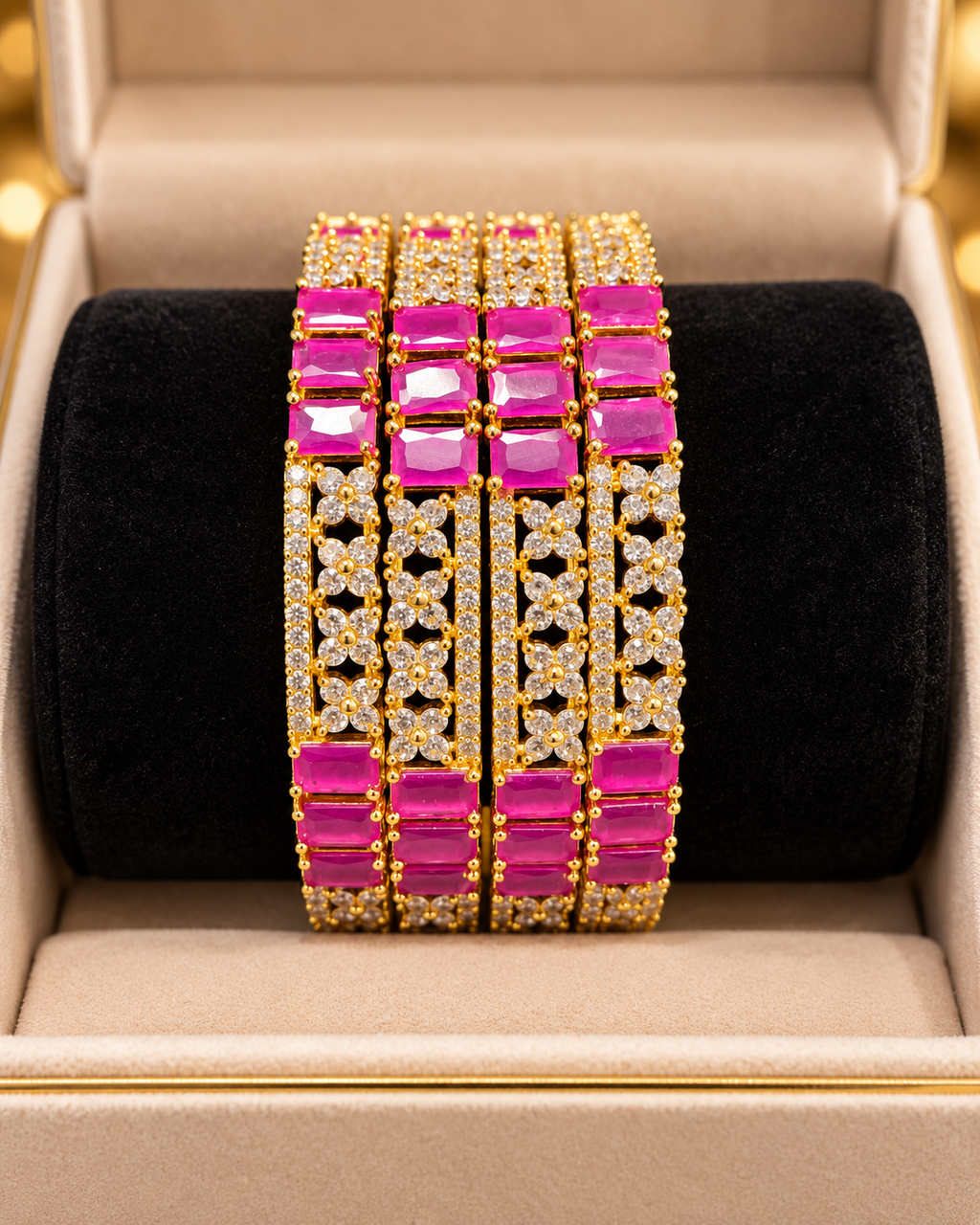 Gold and pink bangles close up