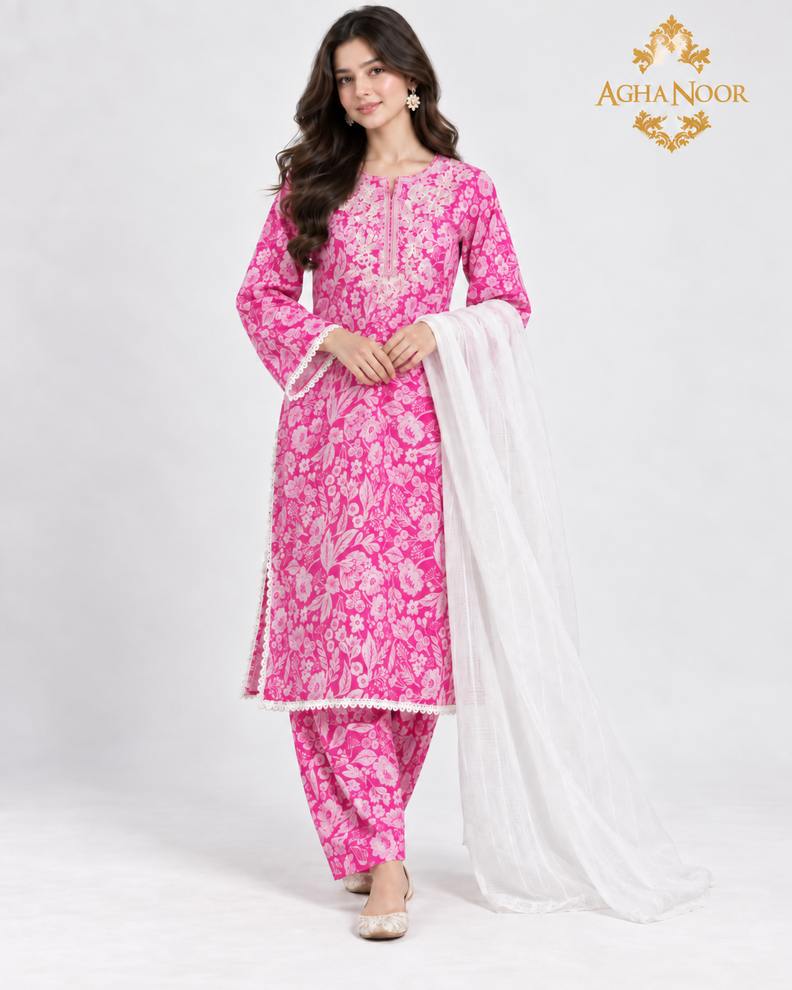 Front view of pink Aghannoor cotton outfit with printed salwar and white dupatta
