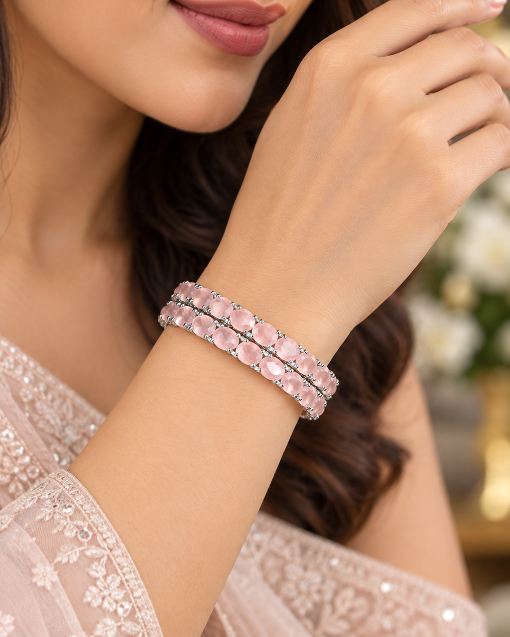 Model wearing the pink silver 2-piece bangle set on her wrist
