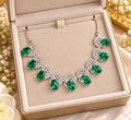Silver and green crystal statement necklace in a jewellery box